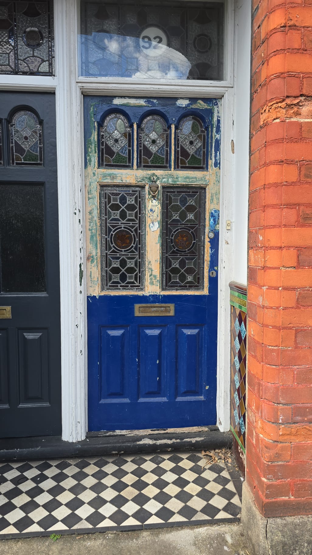 Hallway painting with decorative floor tiles in London property